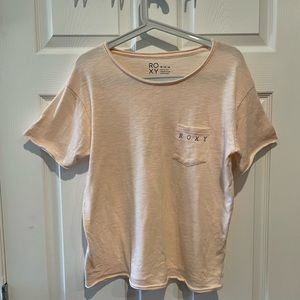 Roxy, salmon coloured shirt,